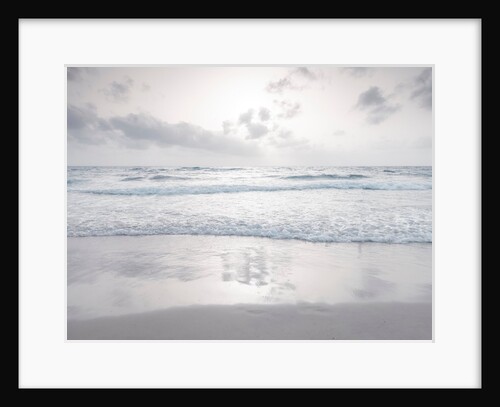 Tranquil beach with cloudscape by Assaf Frank